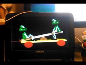 Baby's First Moves (2009) Baby Noah The Elephant Pulls Two Frogs On A Seesaw Pull Toy
