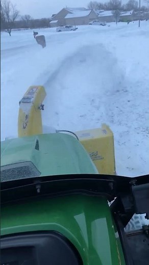 Sidewalk snow removal. John Deere x739 with 47 inch snow blower.