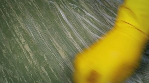Scrubbing And Wiping The Floor In Kitchen Or Hospital