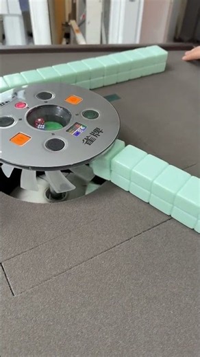 a folding automatic electric mahjong table with a walnut-finish wood frame shuffling system.