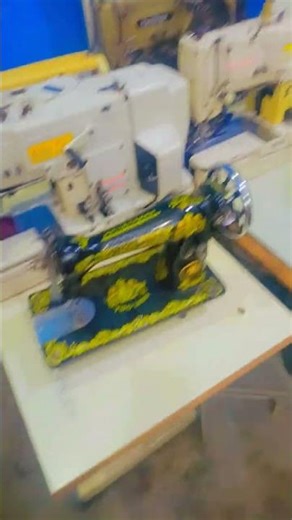 this is a shirt button hole machine