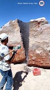 This man's boulder-splitting skills absolutely rock! 🪨 | Daily Mail Video