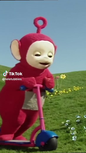 Po's got places to be 🛴 Video: Po, the red Teletubby, rides their scooter.