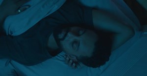 Man Sleeping in Bed at Night