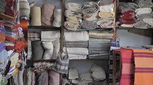 colorful carpet hand made tradition. beautiful rug pattern from the middle east. original handmade craft videos without factory intervention. close away shoot