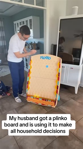 Mamamamamamamidwest on Instagram: "The plinko board now makes most decisions at or house…. As a lifetime lover of the price is right, my husband could not say no to buying the plinko board. #priceisright #plinko #decisions #dad #chores #costcofind"