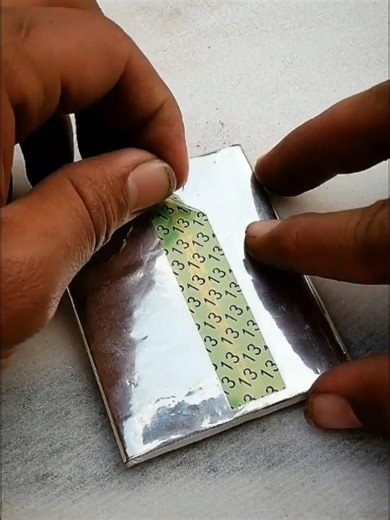 Do not open the battery at home. If the battery is bad or swollen, take it to a mobile repair shop.