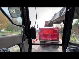 Graving for sidewalks with GRADAll