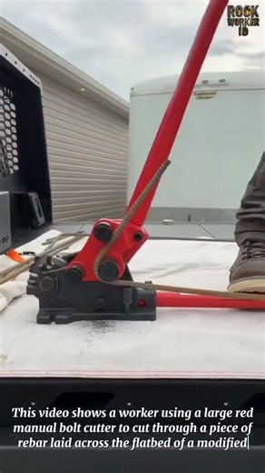 Cutting Rebar with a Manual Bolt Cutteron a Truck Bed Job Site Setup