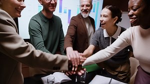 Diverse Business Team Demonstrating Unity and Collaboration | Free Stock Video Footage