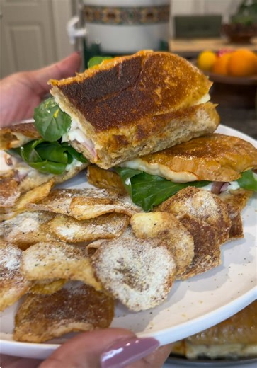 All right y’all, after getting that fresh lettuce and spinach from my cousin, I had to make a sandwich. So here we are, grilled cheese & ham loaded with lettuce, spinach, sun-dried tomatoes, red onion, bell pepper, Duke’s mayo, mustard, jalapeños… FIRE!! And let’s not forget the homemade chips with my little “carpet freshener” seasoning on top 😮‍💨🔥#fyp #foryoupage #fypシ #fypシ゚viral #fyppppppppppppppppppppppp