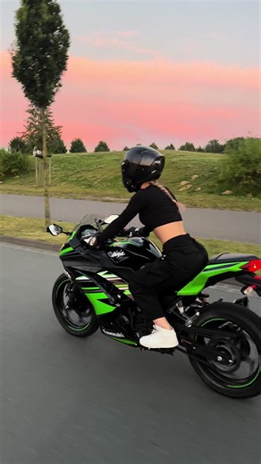 Get Thrilled with an Older Biker Girl Dominating the Road!