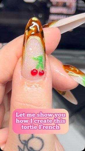 19 reactions · 6 comments | Tortie nails with cherries - tutorial for beginners! Using Angelic acrylic from @byashleighnails Tortie and gold gel from @homeofnailart Green gel is toxicity from @rocksta_ry use code netflixsandbling for discount Daisy brush is from @kassiepayne | Nail Tech Secrets | Facebook