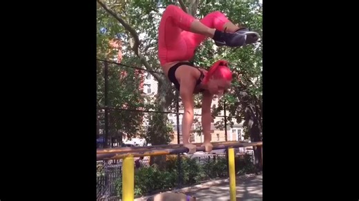 Acrobat Shows off Skills in Gym and World