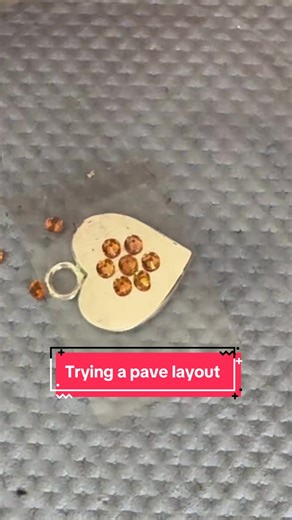 Working on my layout to practice pave stonesetting. Ran out of orange sapphires. Yes, its crooked and the spacing is not accurate. I will use my dividers once I know what I’m doing but this helps me visualise what’s possible. #jewellerytok #gemstoneslovers #Jewellerymaker