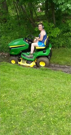 Wife gets brand new John Deere X350 lawn mower stuck in the mud