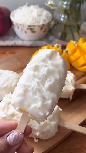 Healthy Meal Today on Instagram: "Homemade Mango Coconut Magnum Bars 🥭🥥✨ (Via: @viricookss) If you love tropical vibes and creamy desserts, you have to try these! Made with fresh mango, sweet coconut cream, and dipped in white chocolate — they’re the ultimate summer treat 🍫💛 Save this recipe for your next freezer obsession 😍👇 📌 Recipe: – 1 cup heavy cream – 1/2 cup sweetened coconut cream – 1 ripe mango ✨ Coating: Melt 1 cup white chocolate & mix with 1/4 cup shredded coconut 📍Freeze & e