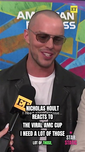 🔥 ON CAMERA: Nicholas Hoult Reacts To The Viral AMC Cup, "I Need A Lot Of Those"