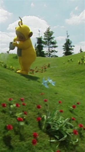 Teletubbies on Instagram: "Showering Mother Nature with all of our tubby love today 💜💚💛❤️ Happy Earth Day! 🌲🌍 Video: Laa-Laa, the yellow Teletubby, waters flowers on the grass outside."