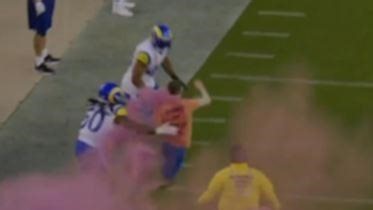 Pitch invader floored by NFL player in brutal hit