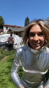 Boyfriend is trying to put car cover on and girlfriend pranks him in a great way. | Emily C