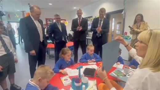 P1 pupils from Enniskillen Model Primary School telling Joe Kennedy III, Special Envoy for Northern Ireland about what they have learned about D-Day. 📽 John McVitty | Impartial Reporter