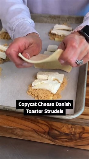 The flavor of these Copycat Cheese Danish Toaster Strudels is better than anything you could find in the frozen aisle. 🤤 Get the full recipe below or in the @allrecipes bio! ⬇️ Ingredients: 6 ounces cream cheese 4 tablespoons butter 6 tablespoons brown sugar 1 sheet puff pastry 1 large egg, beaten 1 cup confectioners sugar 1 tablespoon milk, plus more as needed Directions: Place cream cheese in the freezer for 15 minutes before preparation. Preheat the oven to 400 degrees F (200 degrees C). Lin