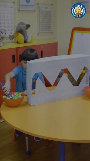Follow the pattern, find the rhythm!🔁🧠 Watch our little learners discovering patterns with precision — one bead at a time.💡🎯 At Podar Prep, every moment is a learning moment — especially the playful ones. 💛✨ #PodarPrep #EarlyLearning #LearningThroughPlay #PlayWithPurpose | Podar Prep India