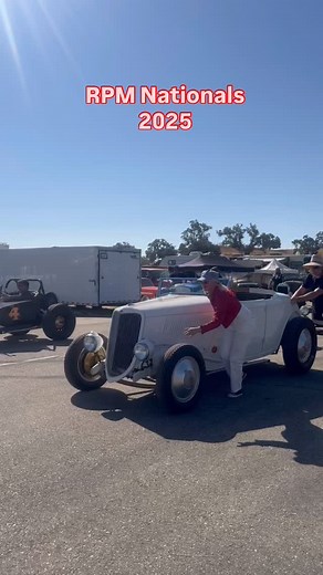 In the staging lanes of a race, it is customary to push your car to prevent overheating while waiting for your turn on the track. I believe this is @thee_stacie_lee of the Hornets SCTA pushing her immaculate 1934 Ford to the starting line during @rpm_nationals and @pit_stop_ranch Matt of the Roadrunners SCTA giving her a hand. | Remy Eaves