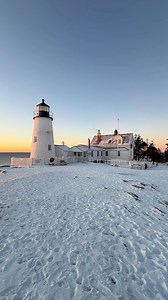 Pemaquid Point Lighthouse covered in snow during sunrise | Barry Mullin
