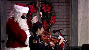 104K views · 191 reactions | A sweet old-fashioned carol of Christmas is performed by husband and wife team, Master Sgts. Woods, with a little help from our friends at the The United States Army Old Guard Fife and Drum Corps, Sgt. 1st class Matthew Bell on bodhrán and Staff Sgt. Barbi Risken on penny whistle..... and of course, Santa Claus on the upright bass! | The United States Army Band | Facebook