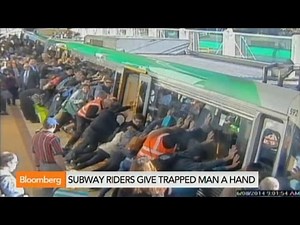 Watch Subway Riders Rescue a Trapped Man
