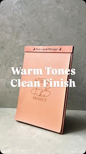 This menu board features dark beige faux leather paired with a rich...