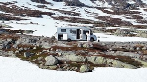 RV Camping in the Snowy Mountains of Norway