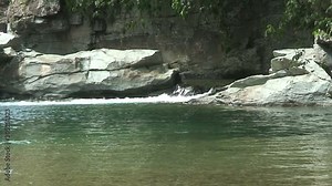 Fast flowing river with clear water in the Philippines