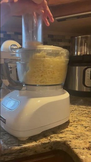 Why is Grating Cheese with a Food Processor so Satisfying?