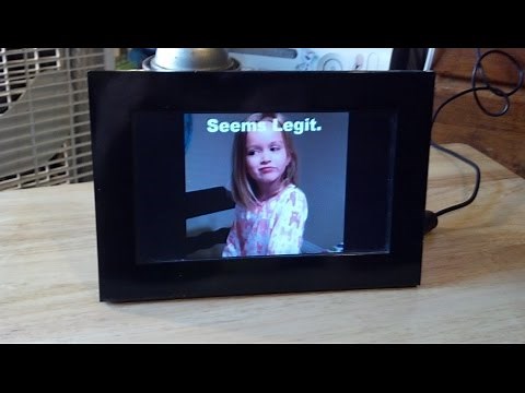 A Coby digital photo frame model DP-700