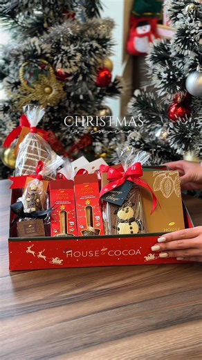 The ultimate holiday haul is here! 🍫🎅 This House of Cocoa gift box features adorable chocolate trees, hot chocolate spoons, a beautiful praline selection, and seasonal chocolate bars. Available now at all branches! #CozyVibes #HotChocolateSeason #HouseOfCocoa #WinterMagic #SweetTreats | House of Cocoa