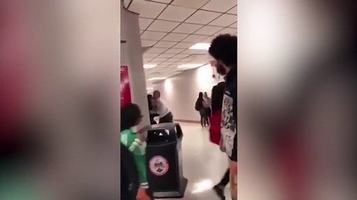 Student attempts RKO wrestling move on school principal