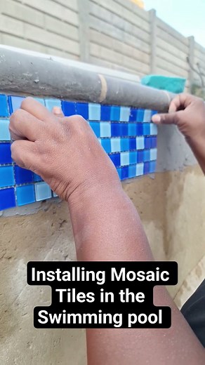 Installing Mosaic tiles in the Swimming pool