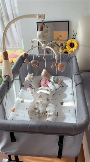 The crib mobile Dad bought is amazing! My baby can play with it for ages and falls as