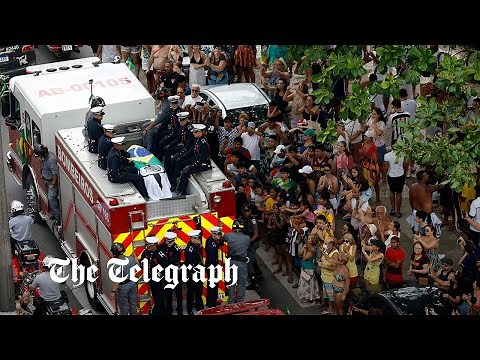 Pele's funeral: thousands line streets for Brazil legends procession in Santos