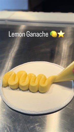 Lemon Ganache🍋⭐️ . Save and use it 🙌🏻 . Follow the steps and make this amazing lemon ganache that taste so good and refreshing , use it for your macarons , cakes or decorations . Food coloring is optional it has yellow color eve if you don’t add it . . Recipe : 430 gr white chocolate 300 ml heavy cream 70 gr lemon juice 3 lemon zests 50 gr inverted sugar 35 gr unsalted butter 2 gr food coloring ( optional ) . . #fypシ #reels #food #kitchen #pastry