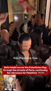 Bella Hadid waves the Palestinian flag through the streets of Paris, continuing her advocacy for Palestine 🇵🇸🇵🇸 @bellahadid #bellahadid #Paris #model #fashion | Celebrities4Palestine