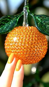 904K views · 10K reactions | Picking and slicing a rhinestoned orange  for some satisfying ai ASMR | DJ Satisfying | Facebook
