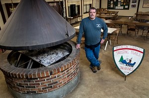 ‘Snirt’ is not snow: West Michigan club stays open but snowmobile culture melting away