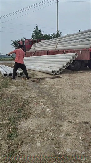 Unloading Heavy Concrete Poles: The Brute Force Behind Infrastructure Build