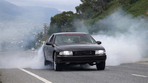 Custom Impala sedan takes on burnouts with oversized wheels