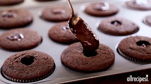 Chocolate Guinness® Cupcakes with a Whiskey Filling and Irish Cream Icing http://spr.ly/61878ZBPz | Allrecipes