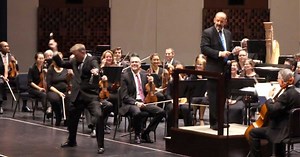 Orchestra Is About To Perform When Triangle Player Takes Over With Comedic Solo